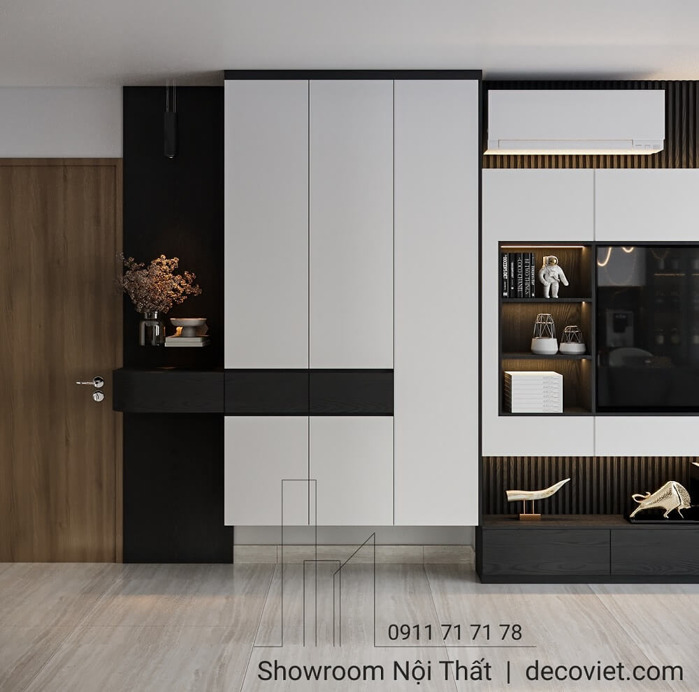 Tủ trang trí kết hợp kệ tivi trong phòng khách căn hộ 1 phòng ngủ.